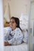 Smiling girl in coloring princess pajama Henry The Goose.